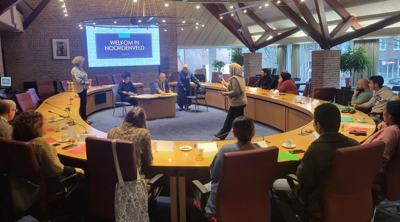 Burgemeester bij uitreiking inburgeringscertificaten